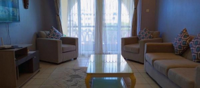 Serene, Well Maintained in a gated Community Mtwapa 3-bedroom Smart apartment, with Swimming Pool, 10 Minutes walk to the Beach